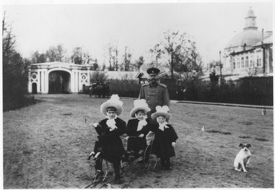 Carl Michael, Duke of Mecklenburg-Strelitz with his 3 nieces, Katya, Menka and Tasha, at Oranienbaum Palace near St. Petersburg, c.1898 by Russian Photographer